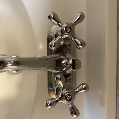 Polished chrome faucet after cleaning